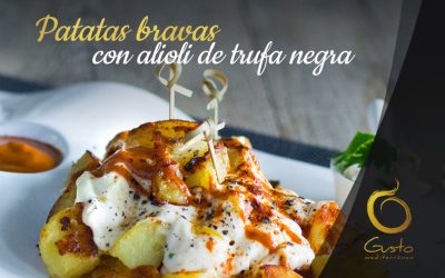 Patatas bravas con alioli de trufa negra